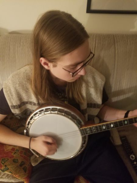 Emile Hooper on banjo.