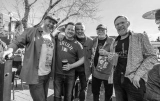 Morrissey's Private Stock members outside on a patio.